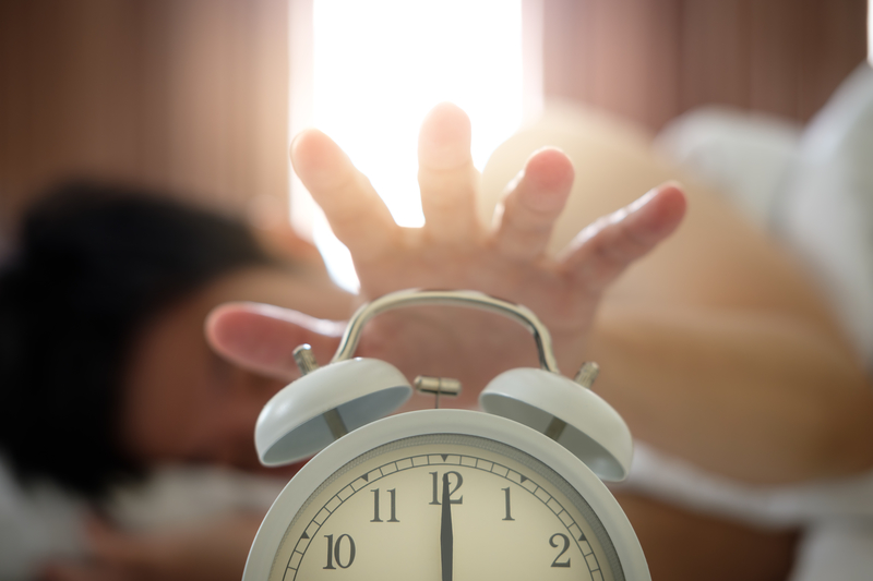 A beeping alarm clock