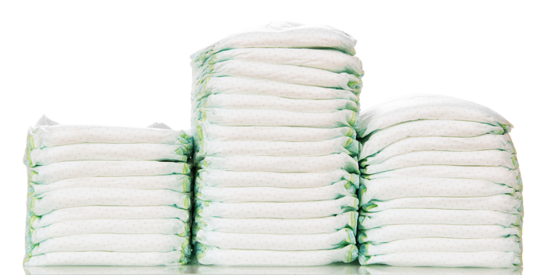 3 stacks of diapers on white background