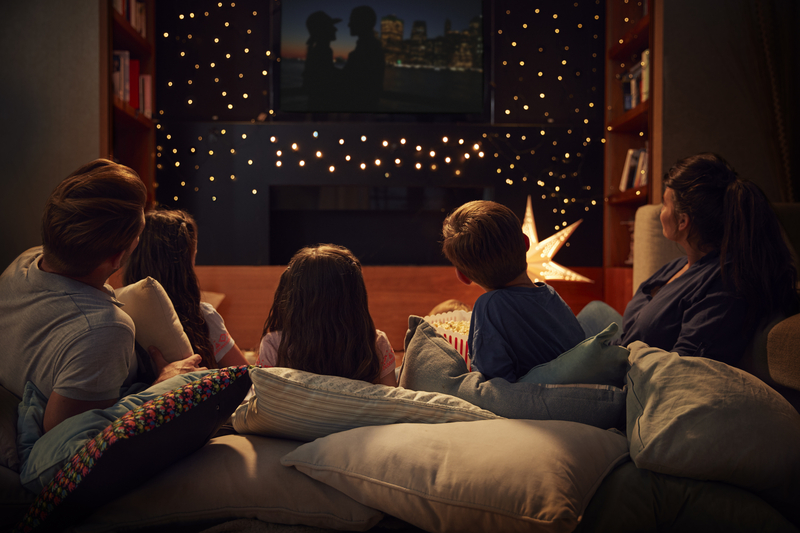 Ask Alexa to dim the lights and turn on the movies for movie night
